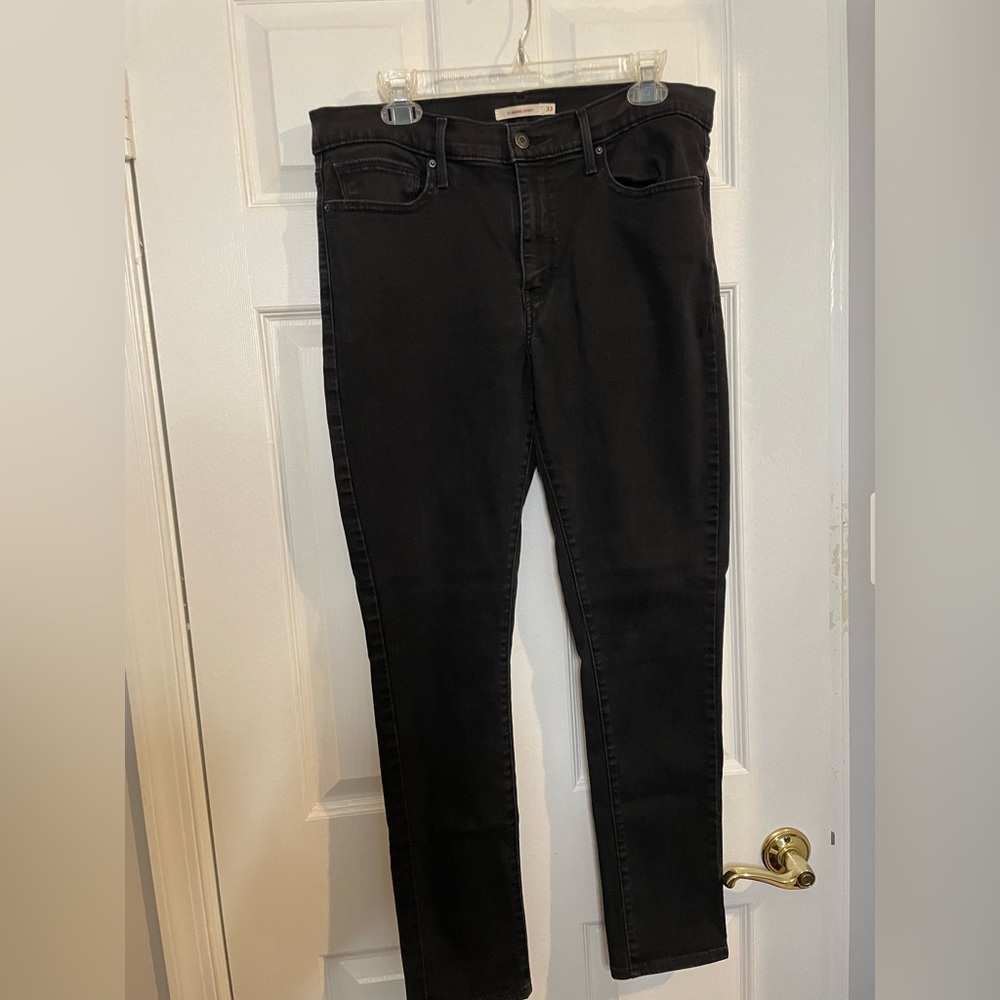Levi’s slimming skinny black jeans - size 33